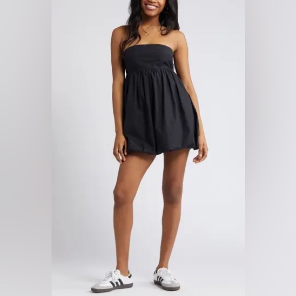 BP black sleeveless mini dress with a bubble hem and bow detail. Size M
